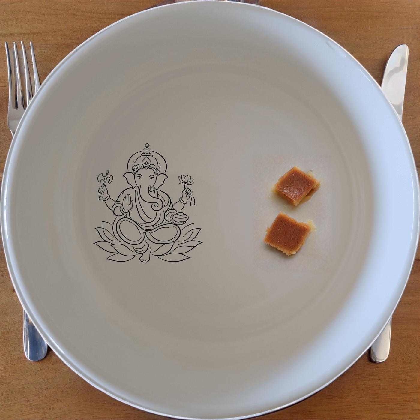 Lord Ganesha Hindu Bowl Set of 4 - Range 1 is a beautifully designed set of four white ceramic bowls featuring the iconic image of Lord Ganesha. Perfect for everyday use or special occasions, these bowls add a touch of spiritual elegance to your dining table.