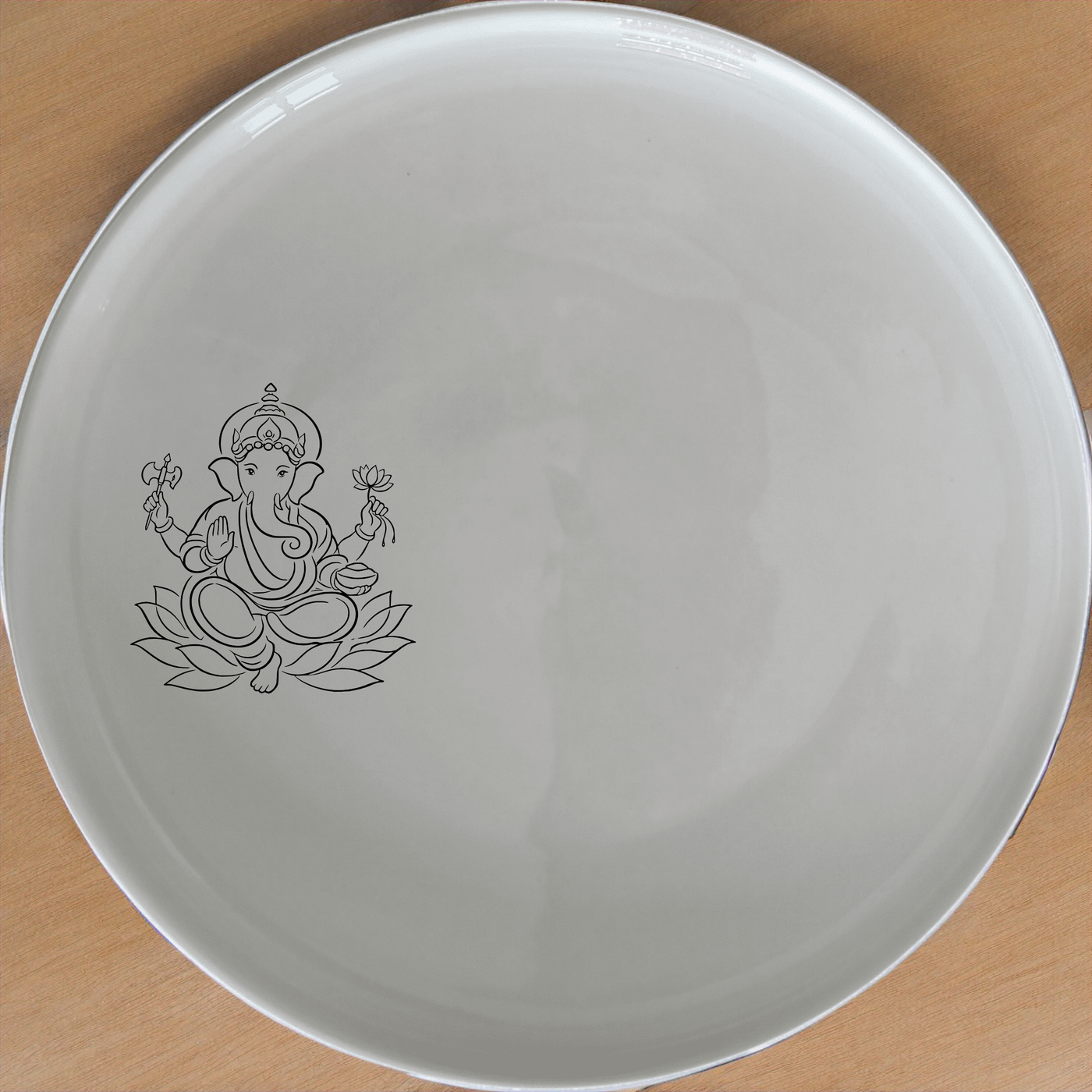 Lord Ganesha Hindu God Side Plate Set of 4 - Range 1 is a beautiful and elegant set of four side plates featuring the divine image of Lord Ganesha.