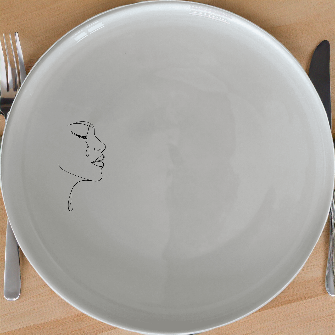Minimalist Woman Face Dinner Plate Set of 4 - Range 1 offers a sleek, modern design perfect for any dining table.