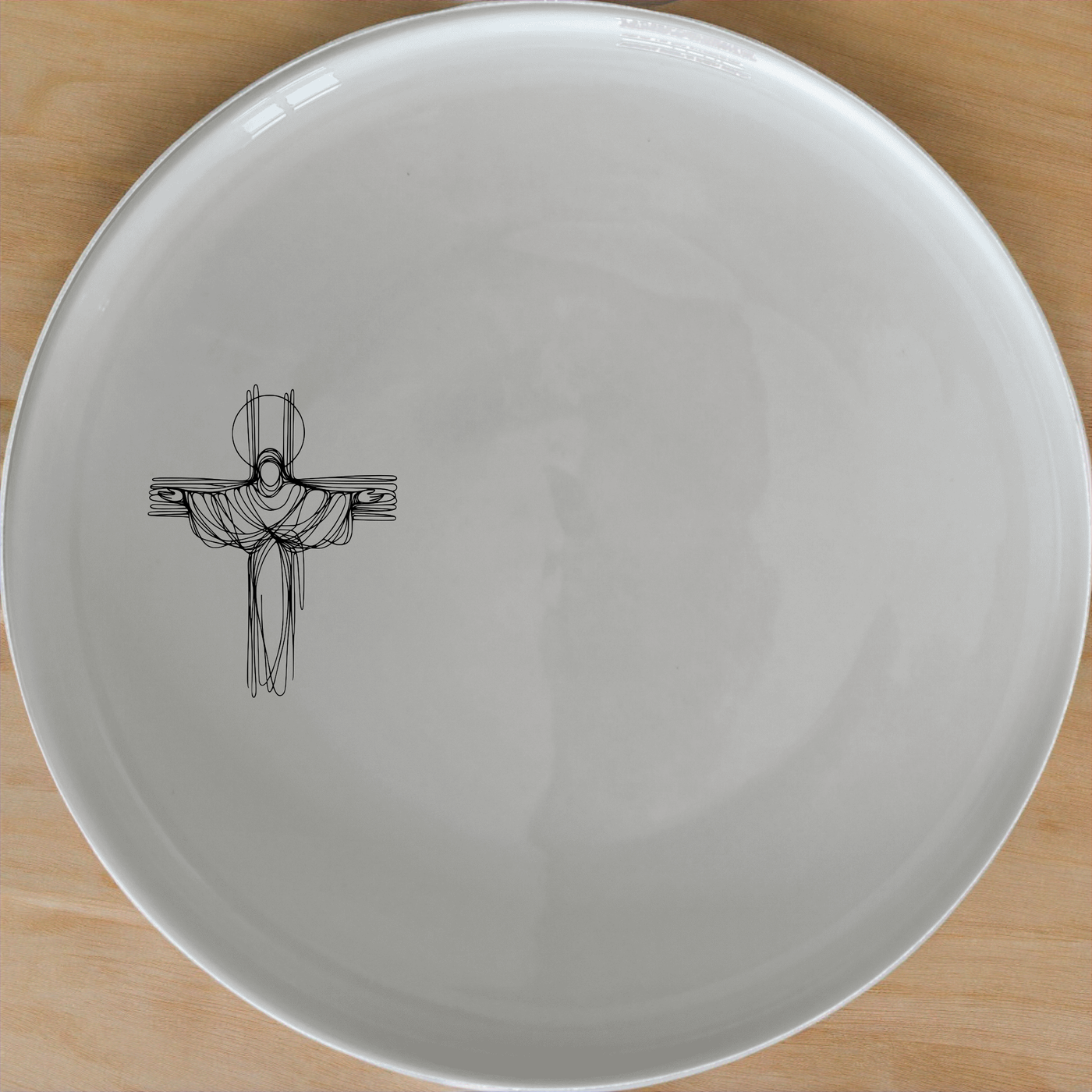 The Crucifixion Jesus Dinner Plate Set of 4 - Range 1 features a striking abstract design, perfect for elevating your dining experience with artistic flair.