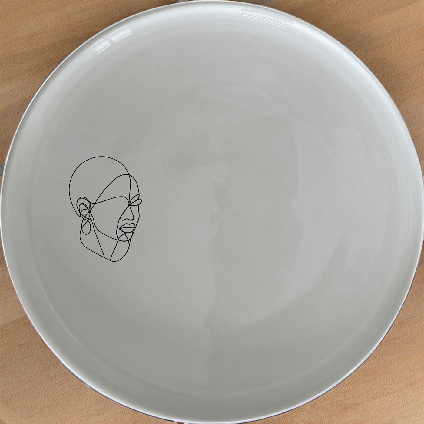 Face Maasi Young Woman Dinner Plate Set of 4 - Range 3 offers a unique and stylish addition to your dinnerware collection.