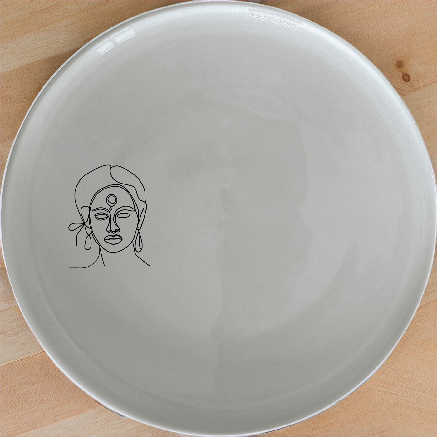 Face Maasi Young Woman Side Plate Set of 4 - Range 4 adds a unique touch to your dining table with its elegant design and quality craftsmanship.