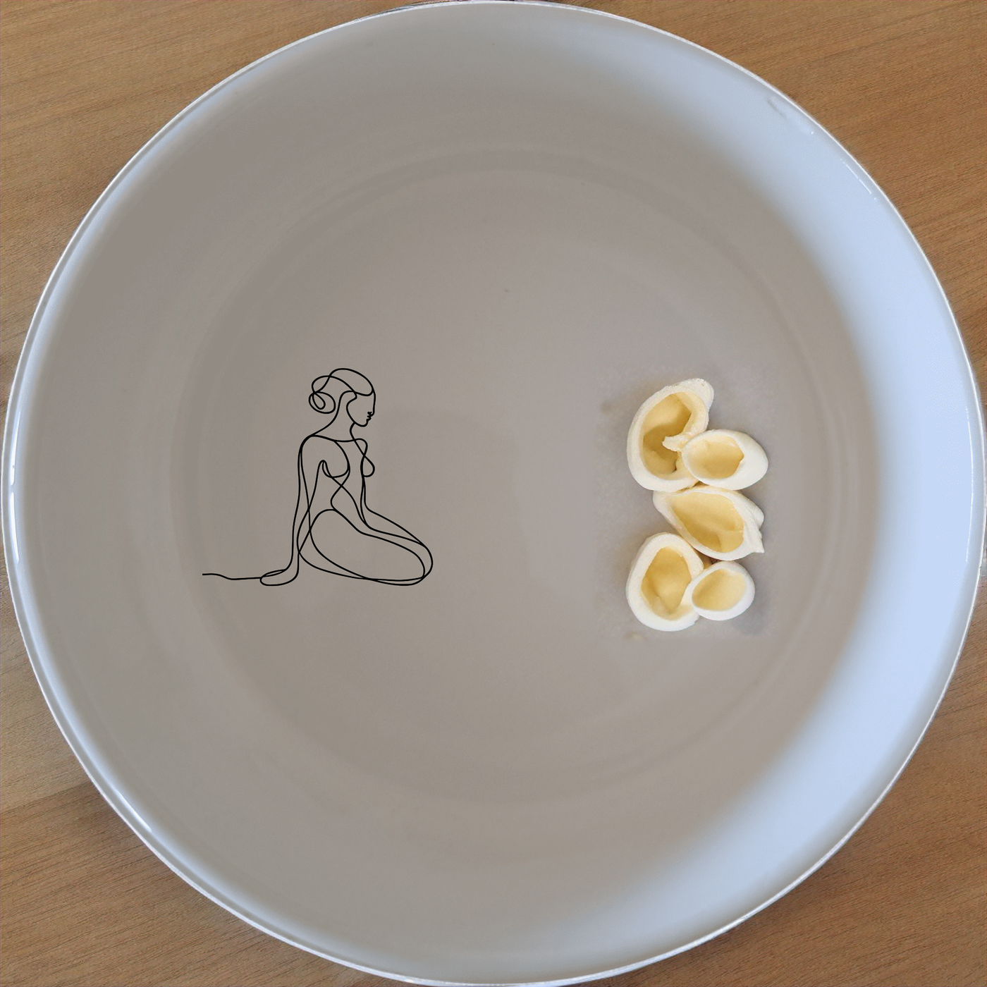 Abstract Human Soul Bowl Set of 4 - Range 12 offers a unique and artistic design perfect for any modern kitchen. Crafted with precision, these bowls bring a touch of elegance to your dining experience.