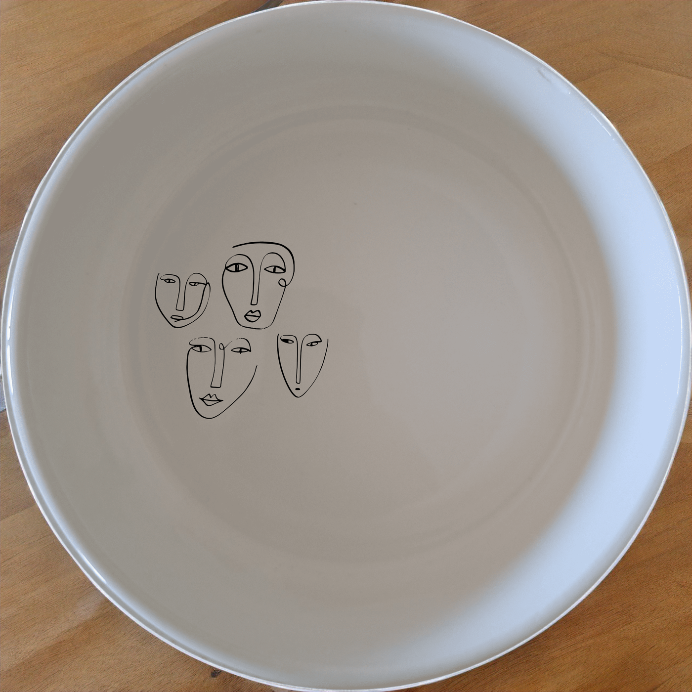 Four Faces Bowl Set of 4 - Range 1 offers a unique and artistic design perfect for any modern kitchen. Crafted from high-quality ceramic, these bowls are both functional and stylish, making them ideal for everyday use or special occasions.