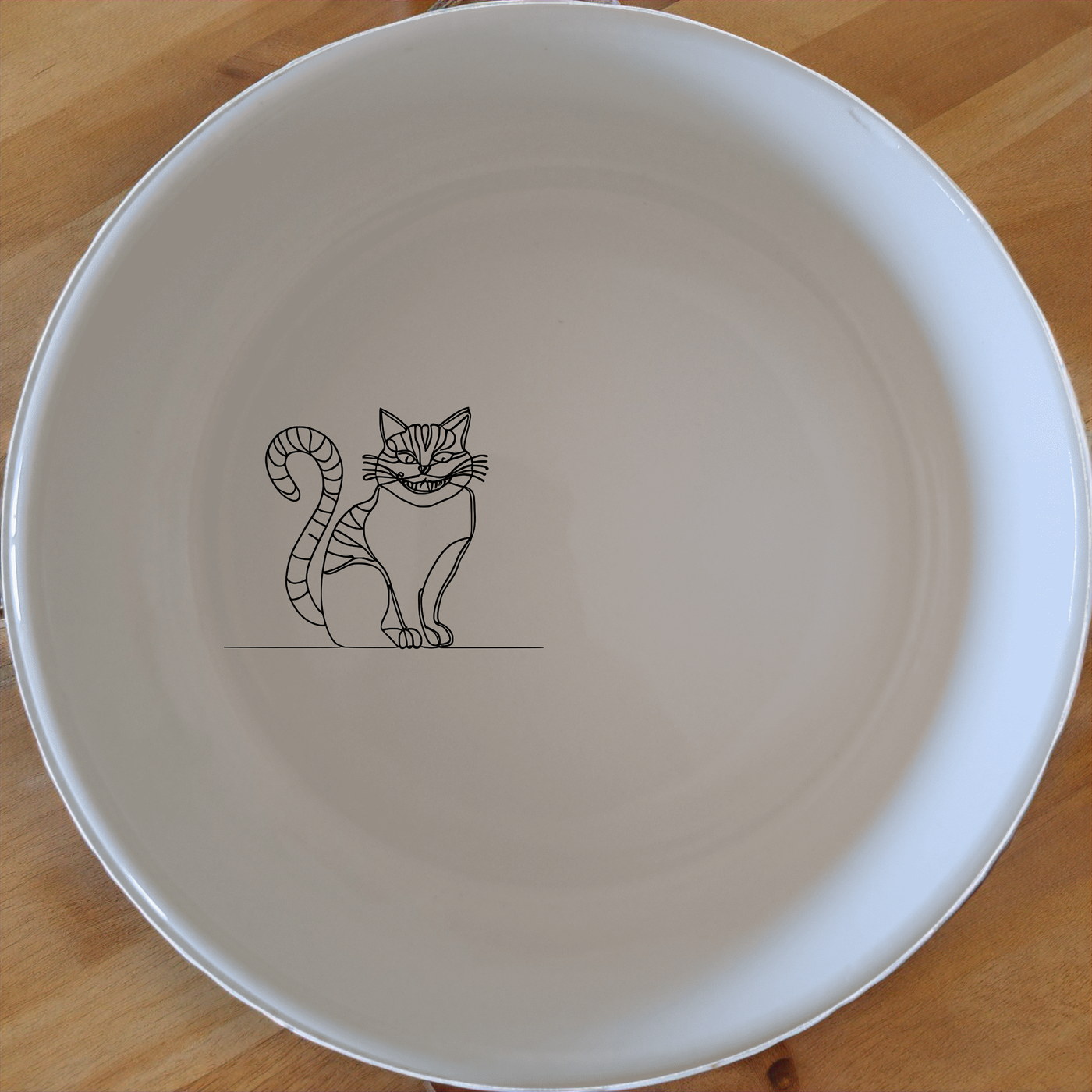 Alice Wonderland Cheshire Cat Bowl Set of 4 - Range 3 adds whimsical charm to your dining table with its iconic design.