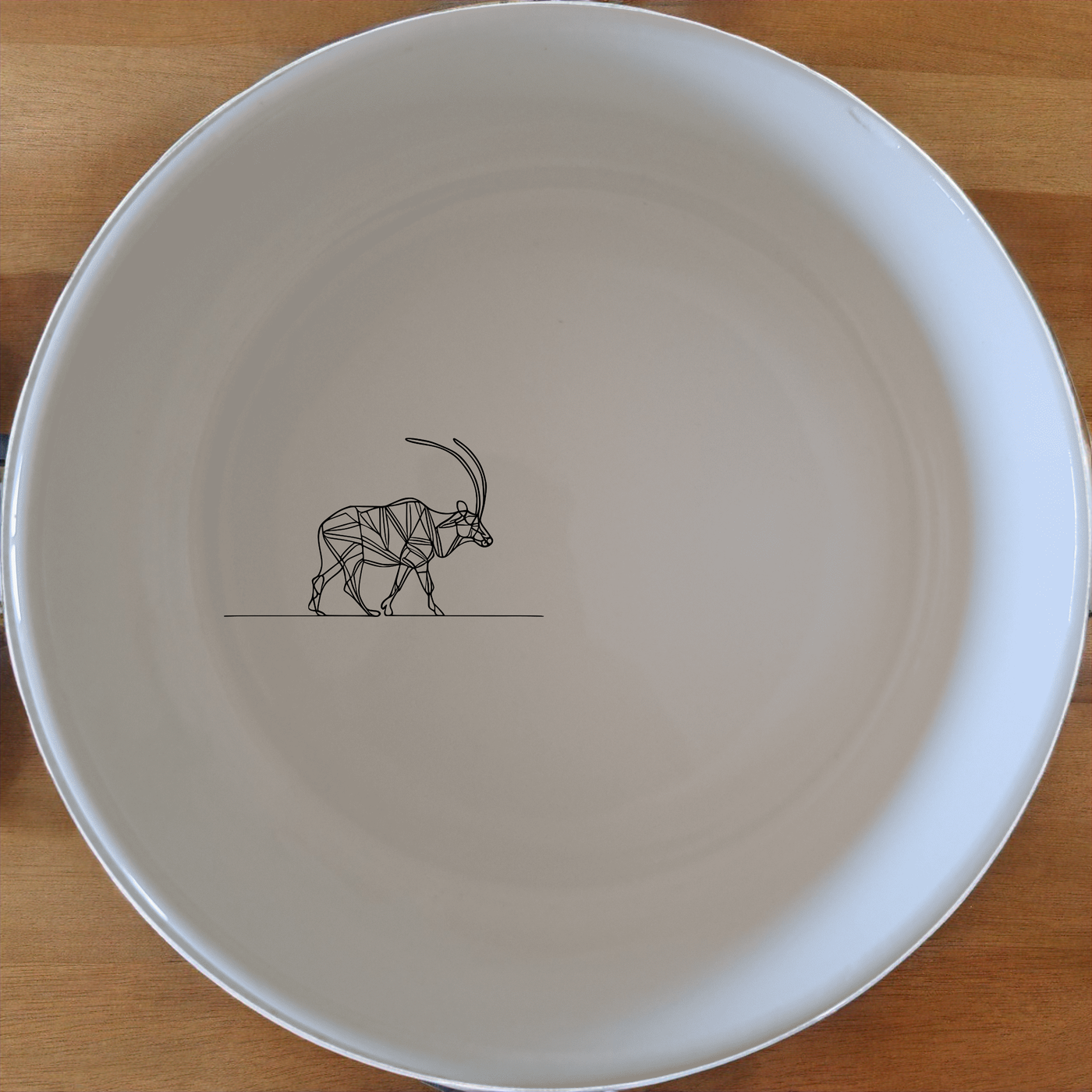Cape Wildlife Bowl Set of 4 - Range 3 is a stunning collection of four 12cm bowls, each featuring a unique geometric animal design. Perfect for modern dining and everyday use.