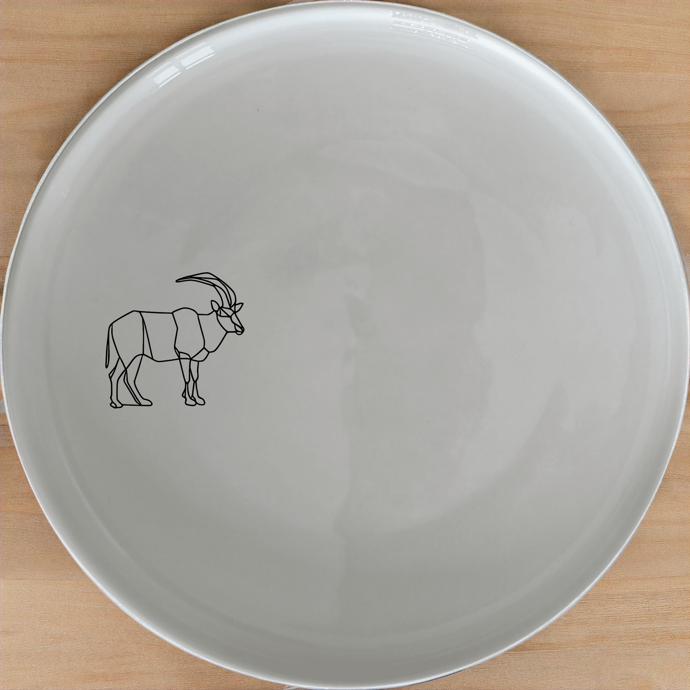 Discover the Cape Wildlife Dinner Plate Set of 4 - Range 2, a stunning collection of ceramic plates featuring elegant wildlife designs.