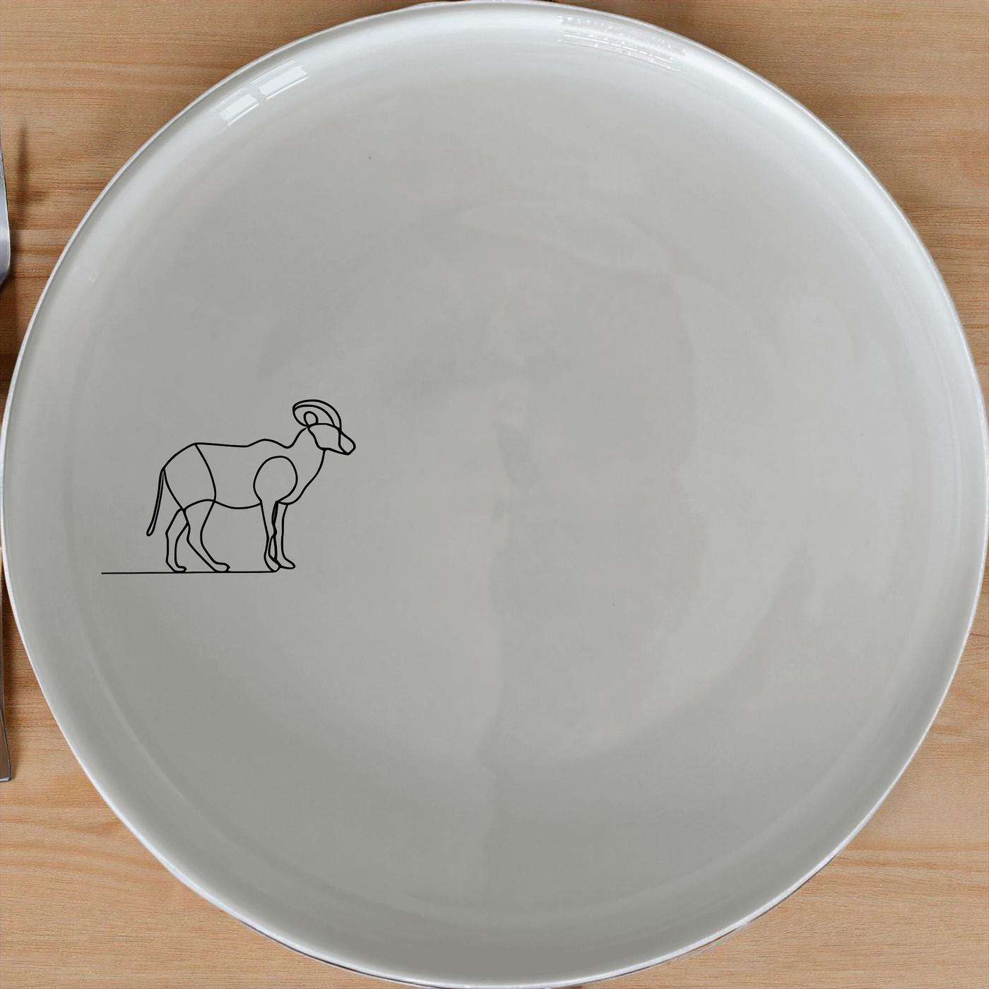 The Wildlife Ram Dinner Plate Set of 4 brings a touch of nature to your dining table, perfect for any home.