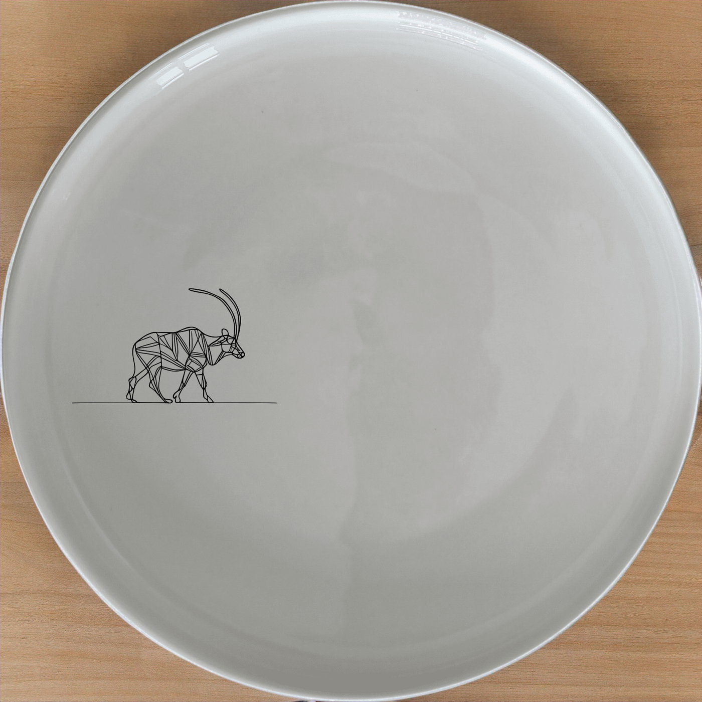 Wildlife Antelope Side Plate Set of 4 - Range 3 is a stunning collection of four elegant side plates featuring intricate antelope designs.