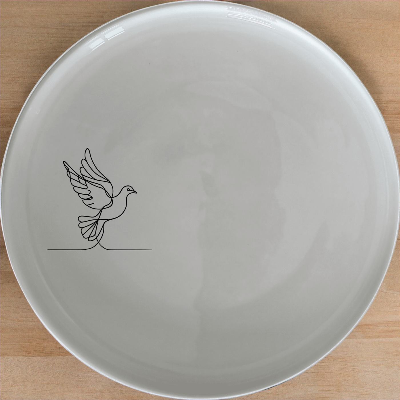 Dove Peace Star Dinner Plate Set of 4 - Range 1 is a beautifully designed set of dinner plates featuring a minimalist dove and star motif. Perfect for everyday use or special occasions.