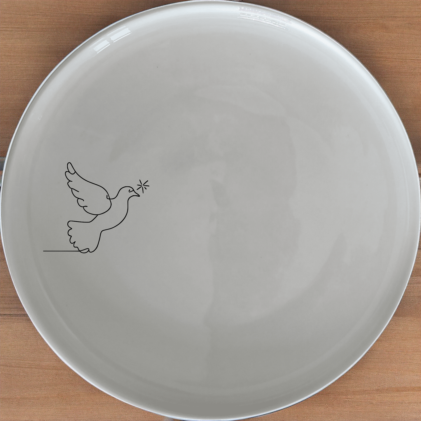 Dove Peace Star Side Plate Set of 4 - Range 2 is a beautifully designed set of four side plates featuring a delicate dove and star motif. Perfect for everyday use or special occasions, these plates add a touch of serenity to your dining table.