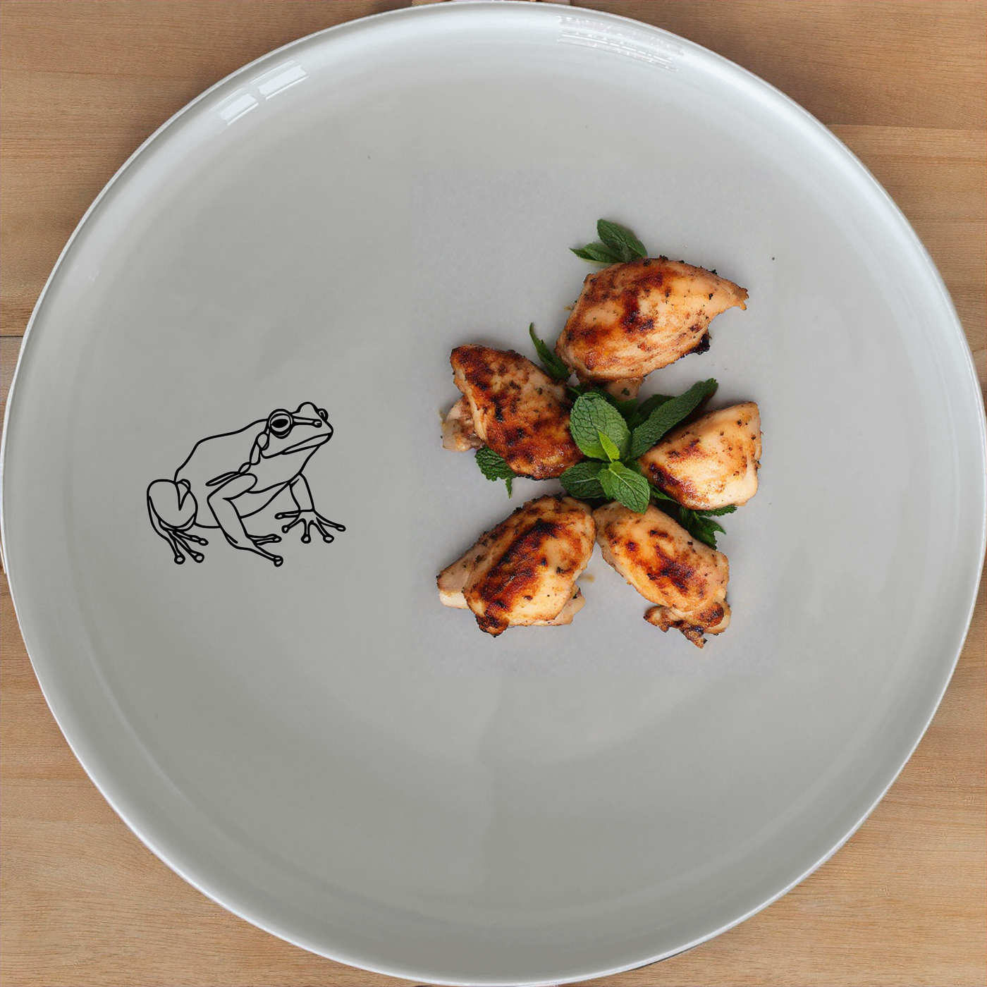 Frogs Reptiles Dinnerware Set of 12 - Range 1 is a charming and versatile dinner set featuring elegant frog and reptile designs.