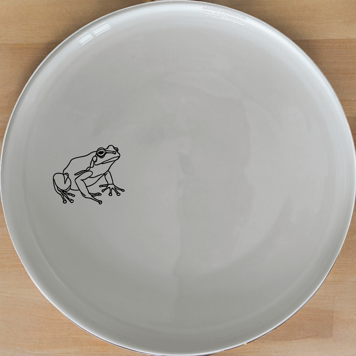 Frogs Reptiles Dinner Plate Set of 4 - Range 1 is a charming and versatile dinnerware set perfect for any dining occasion. Crafted from premium ceramic, these plates feature a delightful frog and reptile design that adds a touch of nature to your table setting.