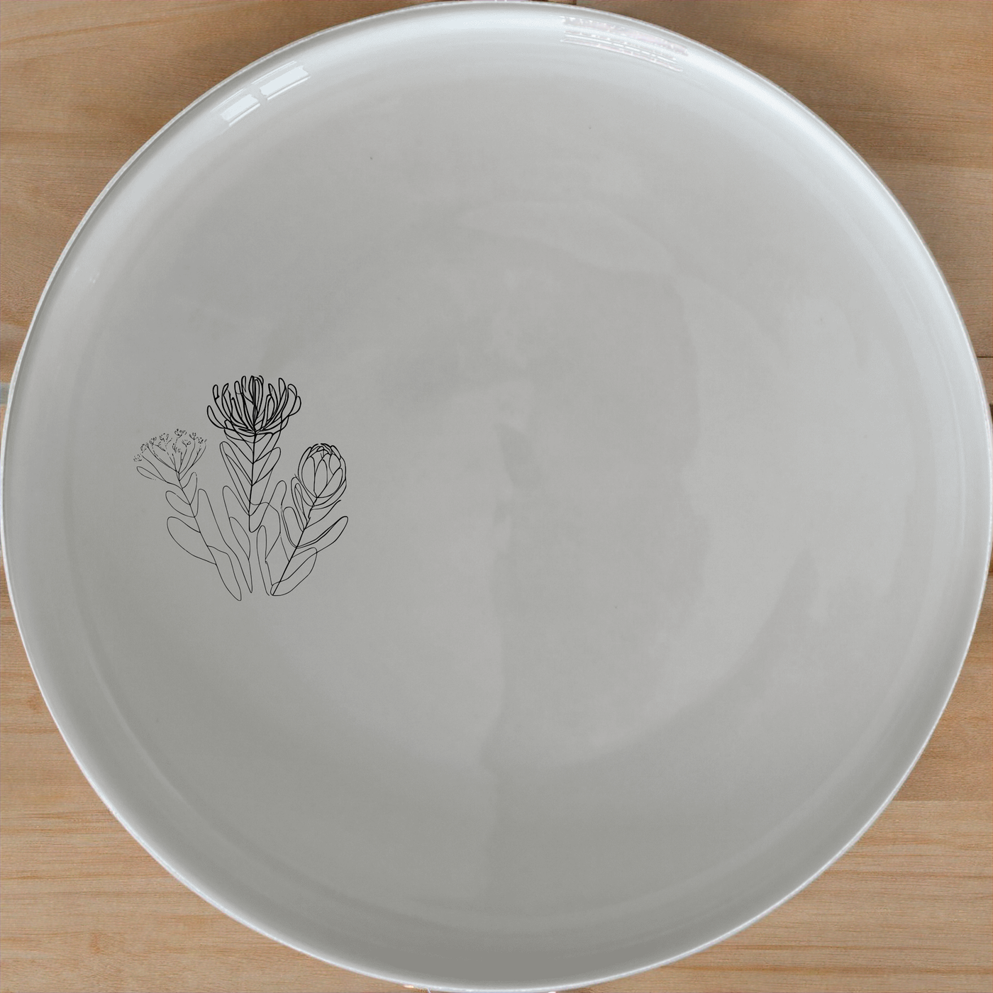 Fynbos Collection Dinner Plate Set of 4 - Range 3 adds a touch of nature to your dining table with elegant botanical designs.
