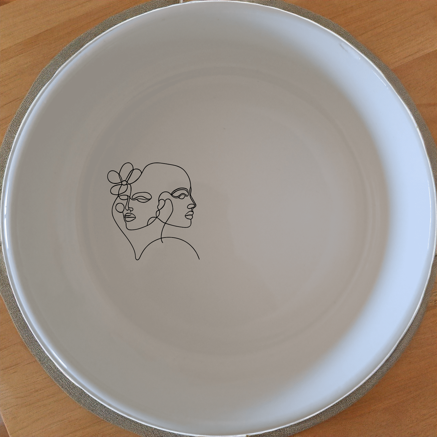 This Line Art Faces Bowl Set of 4 features minimalist line art designs, perfect for modern home decor and everyday use.