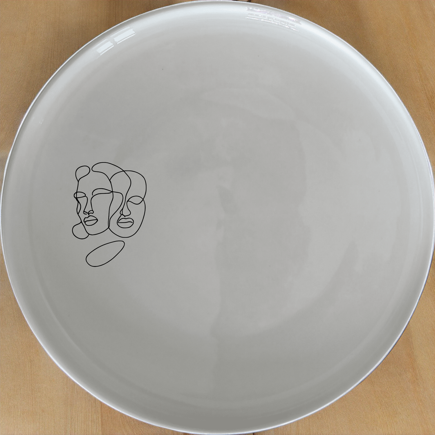 Faces Line Art Dinner Plate Set of 4 - Range 1 is a stylish and modern dinnerware set featuring abstract line art faces on each plate.