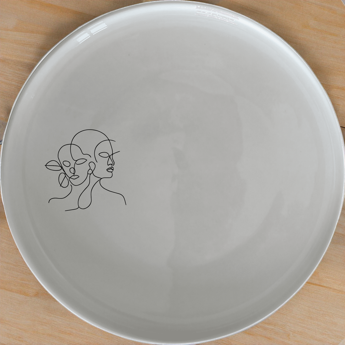 Faces Art Dinner Plate Set of 4 - Range 3 is a stylish and modern dinner plate set featuring abstract face designs. Perfect for any dining occasion.