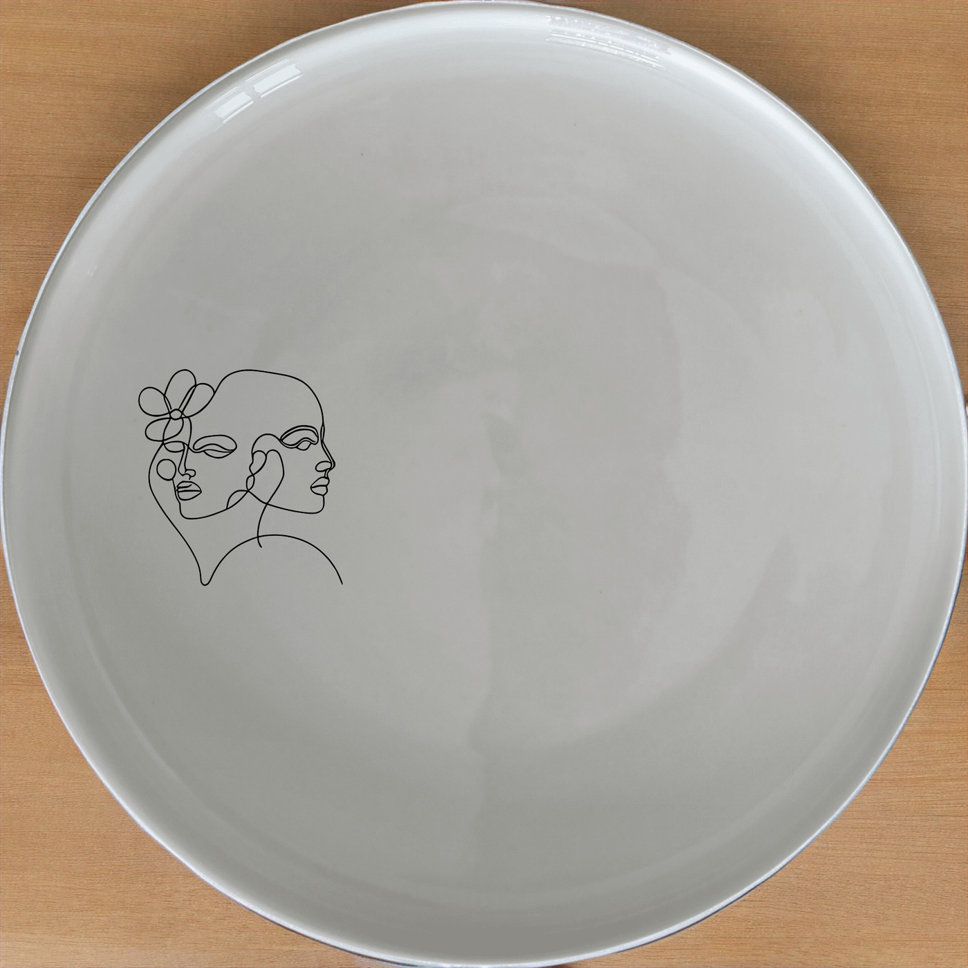Faces Line Art Dinner Plate Set of 4 - Range 4 adds a modern touch to your dining table with minimalist line art designs.