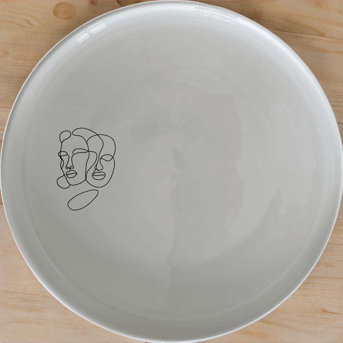 Faces Art Side Plate Set of 4 - Range 1 adds a modern touch to your table setting with abstract line art designs.