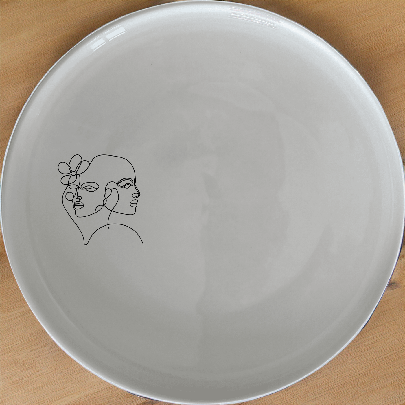 Faces Art Side Plate Set of 4 - Range 4 adds a modern touch to your dining table with abstract line art designs.