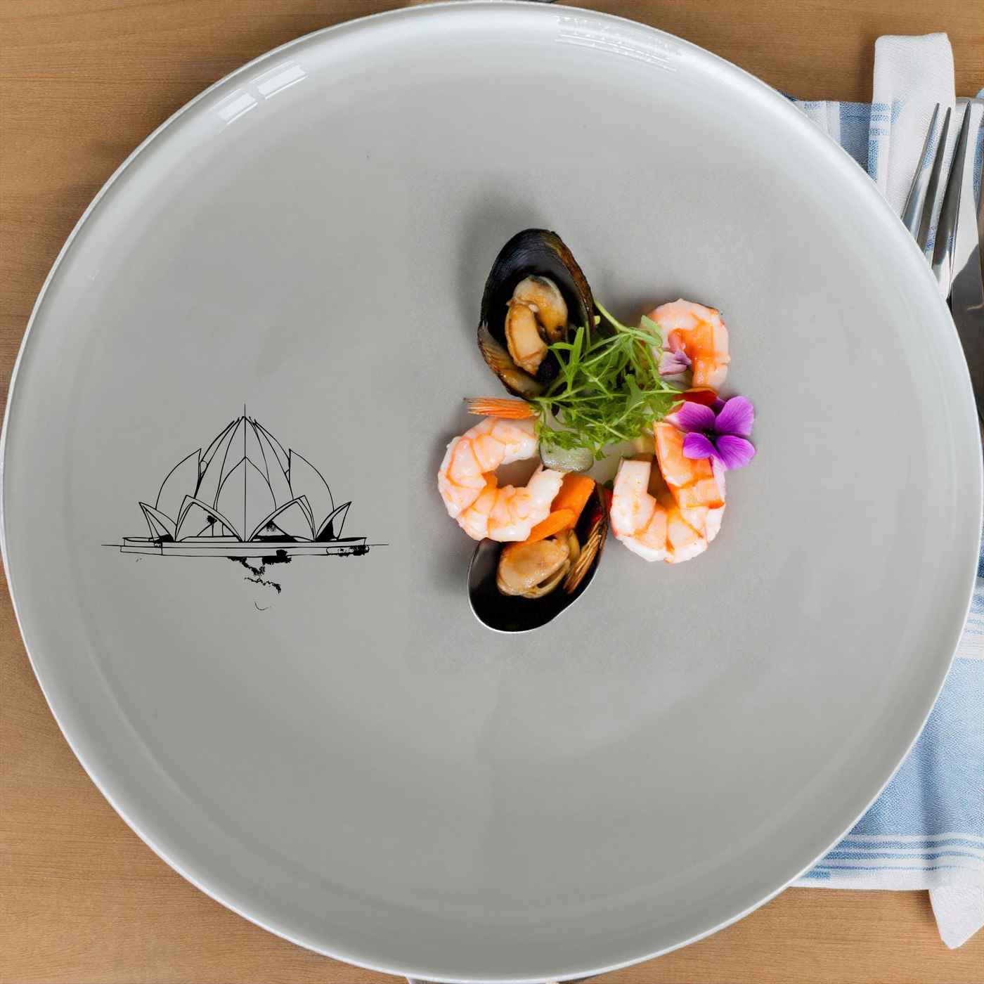 The Lotus Temple Watercolour Dinner Set of 12 features a serene lotus temple design, perfect for elevating your dining experience.