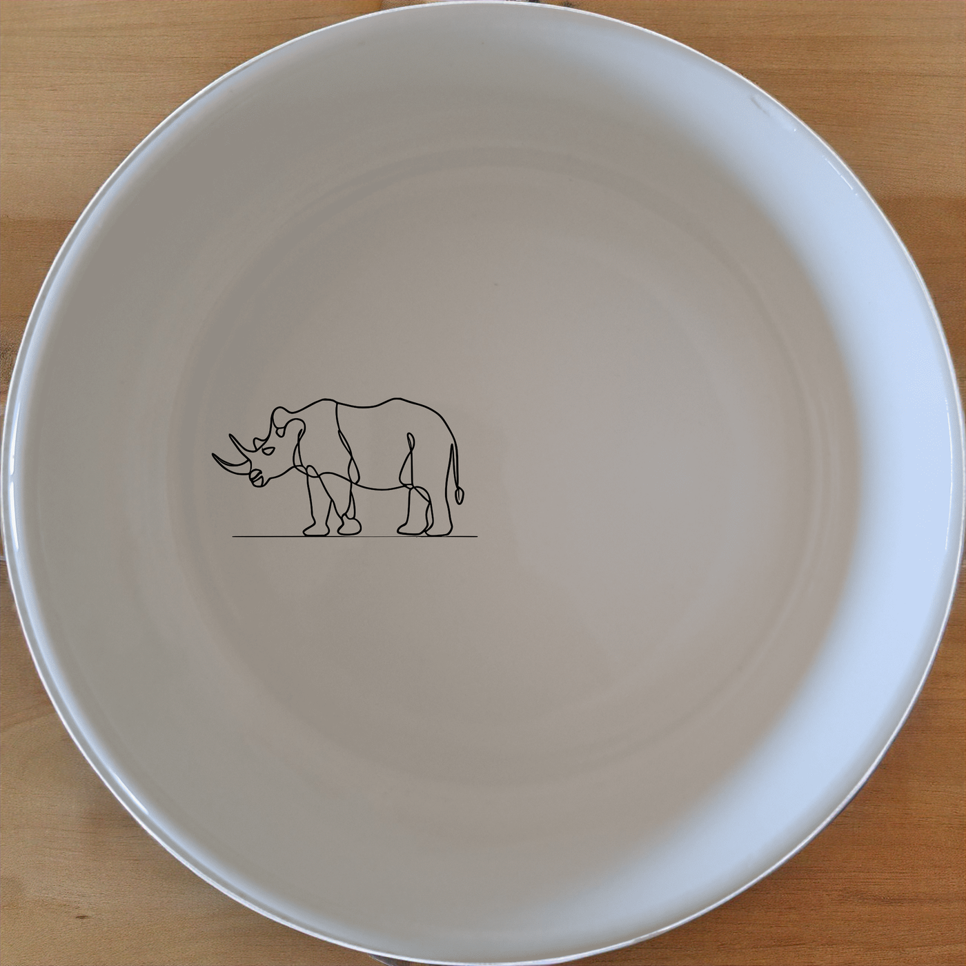 Safari Animals Bowl Set of 4 - Range 3 is a charming collection of four 12cm ceramic bowls, each featuring a unique safari animal design. Perfect for everyday use or special occasions, these bowls add a touch of wildlife to your dining table.