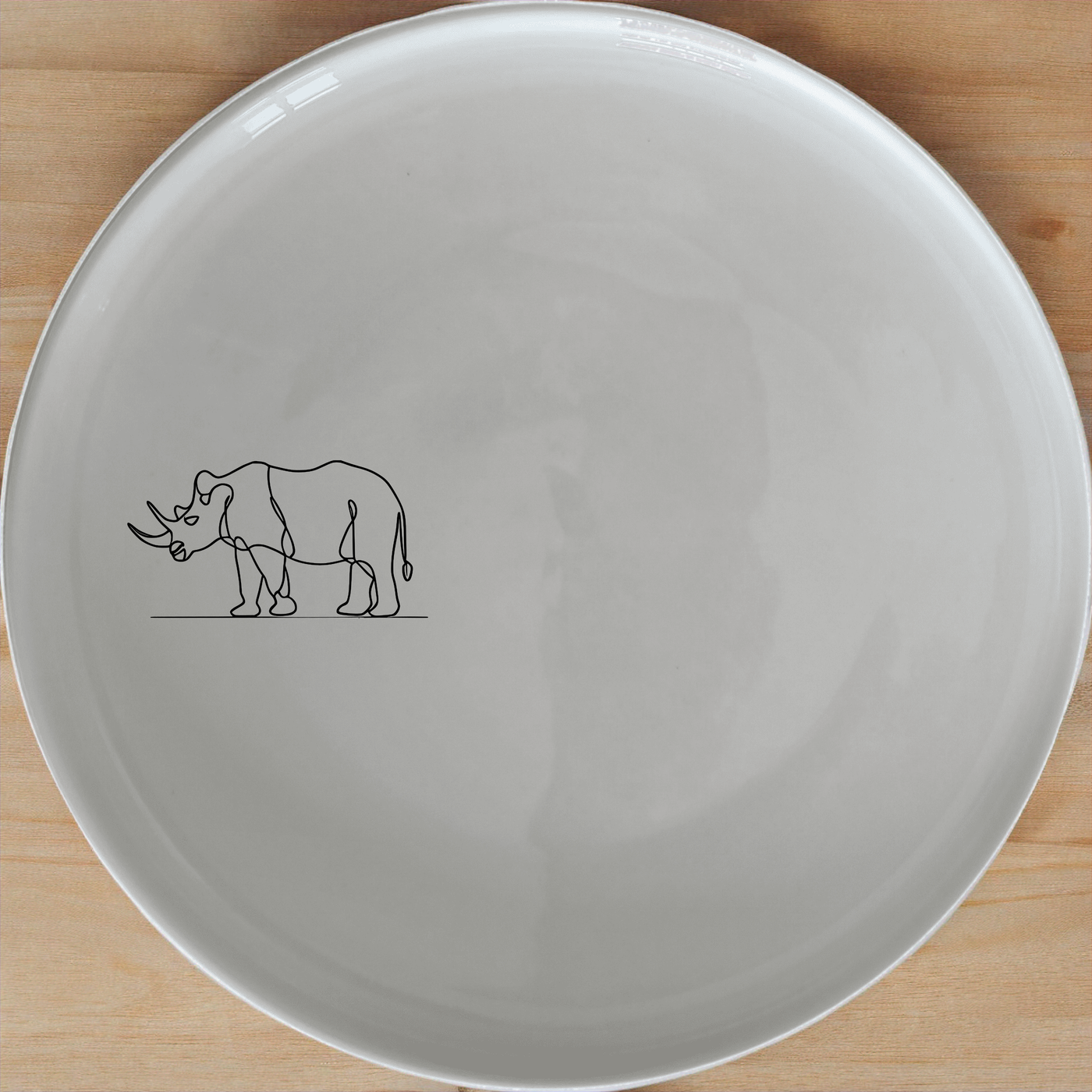 Safari Animal Side Plate Set of 4 - Range 3 is a stylish and versatile set perfect for any dining occasion. Crafted from durable ceramic, these plates feature a sleek design with a subtle animal motif, adding a touch of nature to your table setting. Ideal for everyday use or special gatherings, this set ensures both functionality and aesthetic appeal.