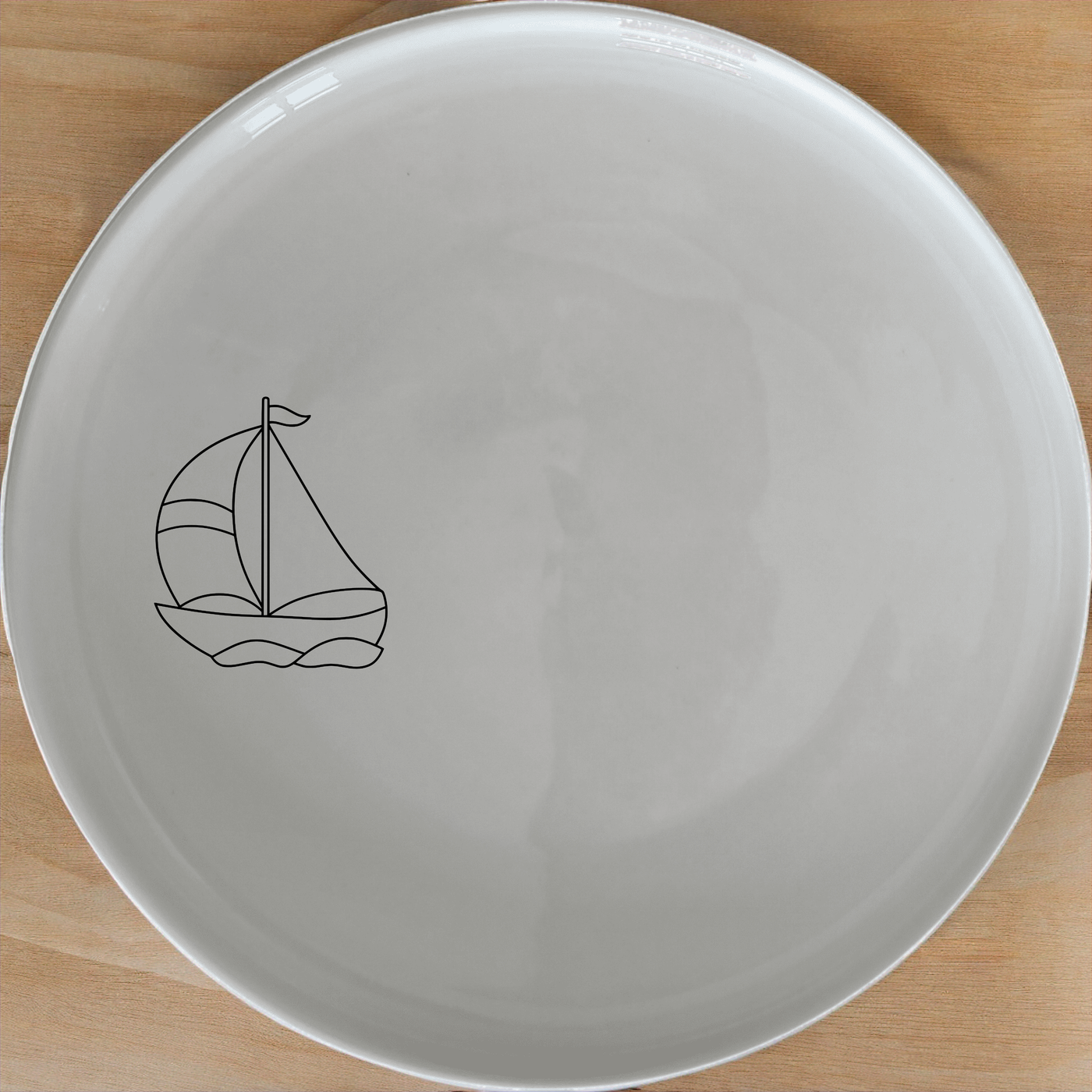 Sailing Boat Sea Side Plate Set of 4 - Range 1 adds nautical charm to your table setting with elegant designs.