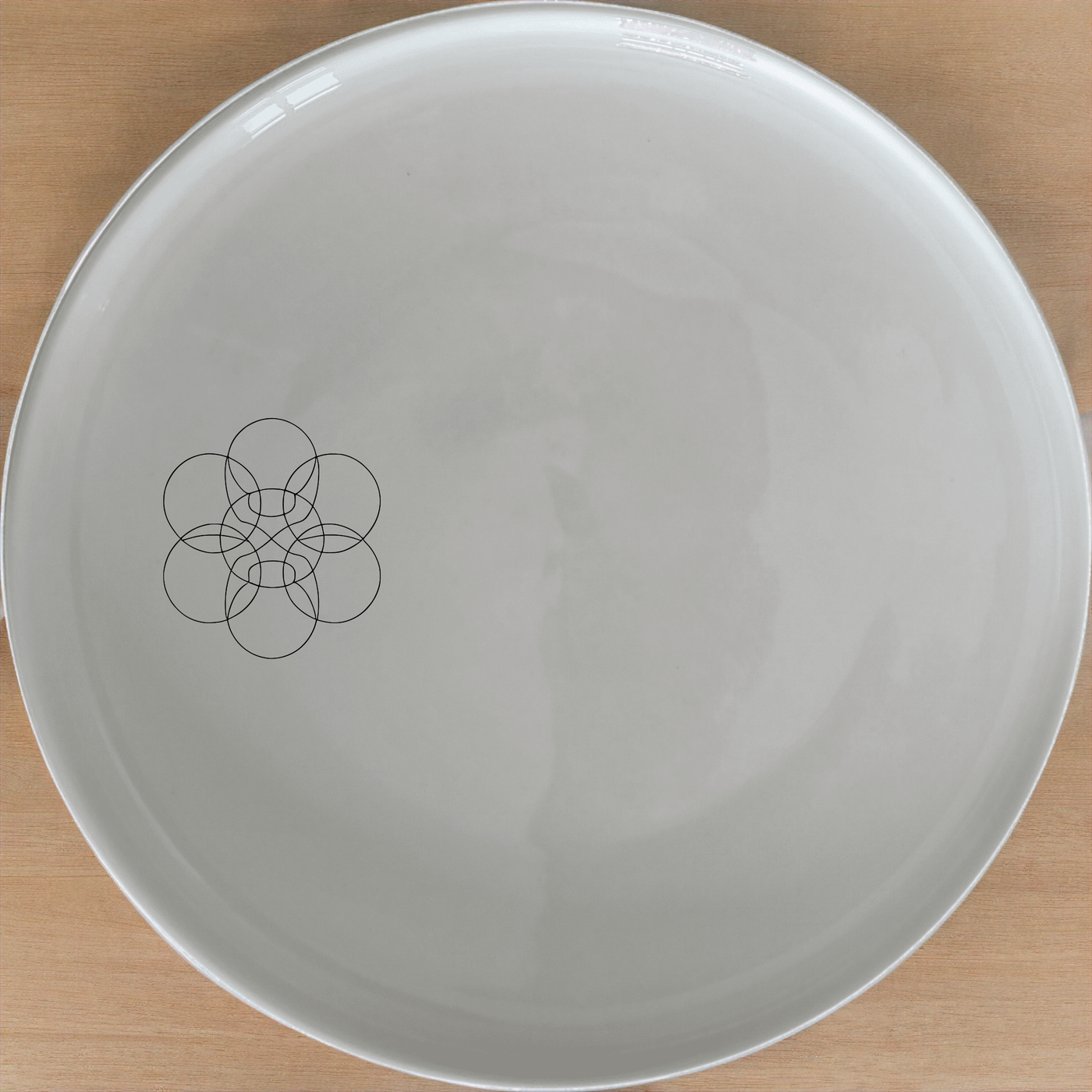 Unity Diversity Dinner Plate Set of 4 - Range 4 is a beautifully designed set of four dinner plates featuring an abstract unity motif. Perfect for modern dining.