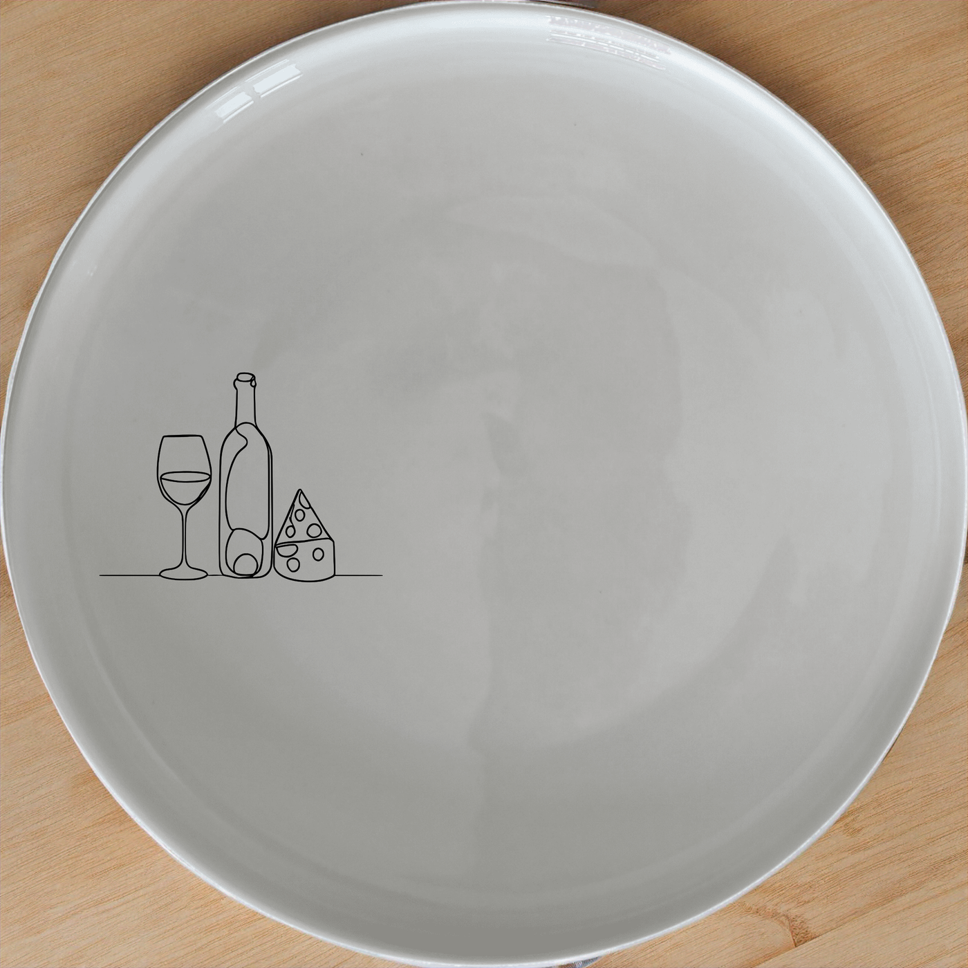 The Wine and Cheese Dinner Plate Set of 4 is a stylish and versatile addition to any dining table, perfect for entertaining guests or enjoying a casual meal.