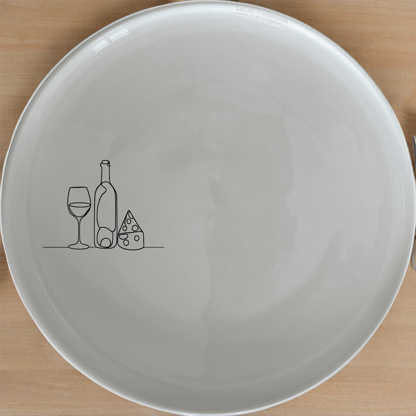 Wine and Cheese Side Plate Set of 4 - Range 2 is a stylish and versatile set perfect for any dining occasion. Crafted from premium ceramic, these plates feature a minimalist design with a subtle wine and cheese motif. Ideal for both everyday use and special events, this set adds a touch of sophistication to your table setting. The smooth, glossy finish ensures durability and easy cleaning, making it a practical and elegant addition to your kitchenware collection.