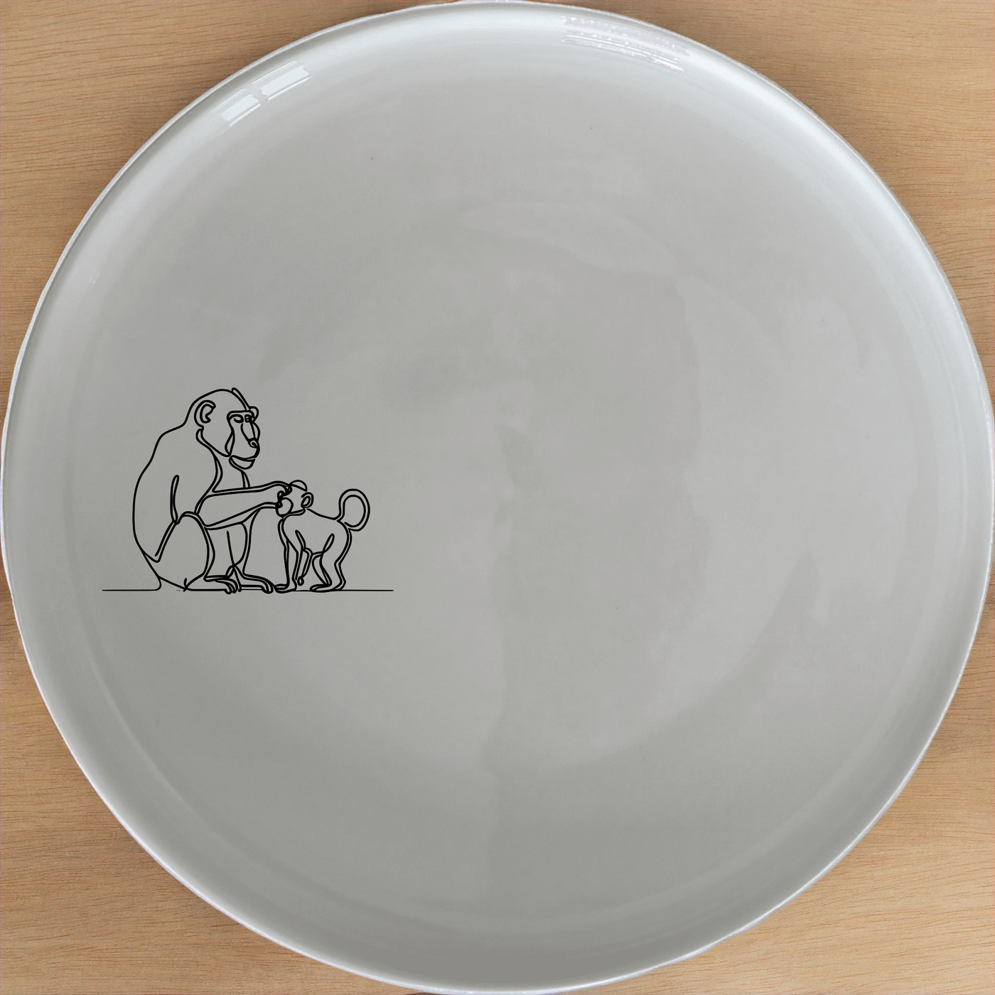 Baboon Troop Social Grooming Scene Side Plate Set of 4 - Range 2 is a charming set of four side plates featuring a detailed illustration of a baboon troop in a social grooming scene. Perfect for adding a touch of nature to your dining table.