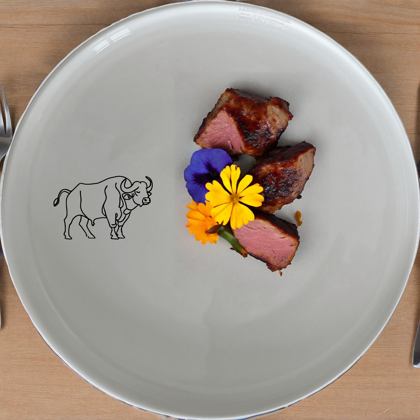 Buffalo Herd Powerful Horns Dinner Set of 12 - Range 3 is a striking and modern dinnerware set that brings a bold, graphic touch to your dining table. Perfect for everyday use or special occasions.