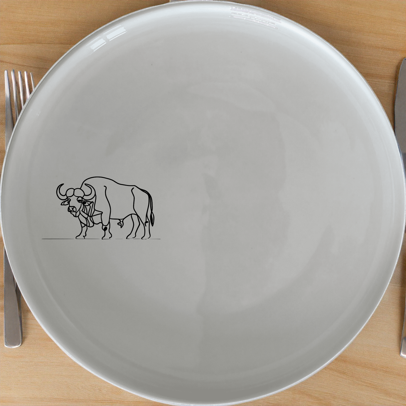 Buffalo Herd Dinner Plate Set of 4 - Range 2 offers a bold and artistic design perfect for modern dining. Crafted from premium ceramic, these plates feature a striking buffalo illustration that adds a touch of nature to your table setting. Ideal for everyday use or special occasions, this set combines durability with aesthetic appeal.