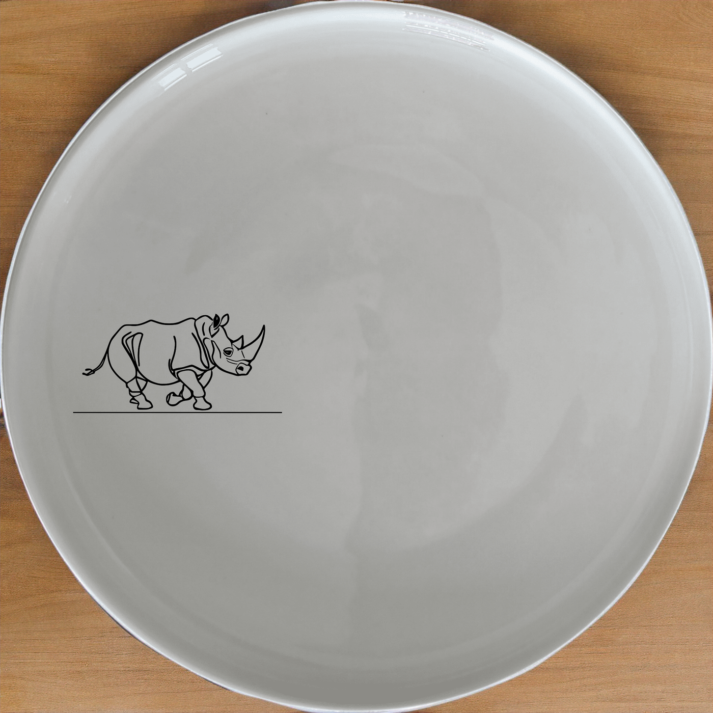 Charging Rhino Horn Side Plate Set of 4 - Range 2 offers a unique and stylish addition to your dining collection.
