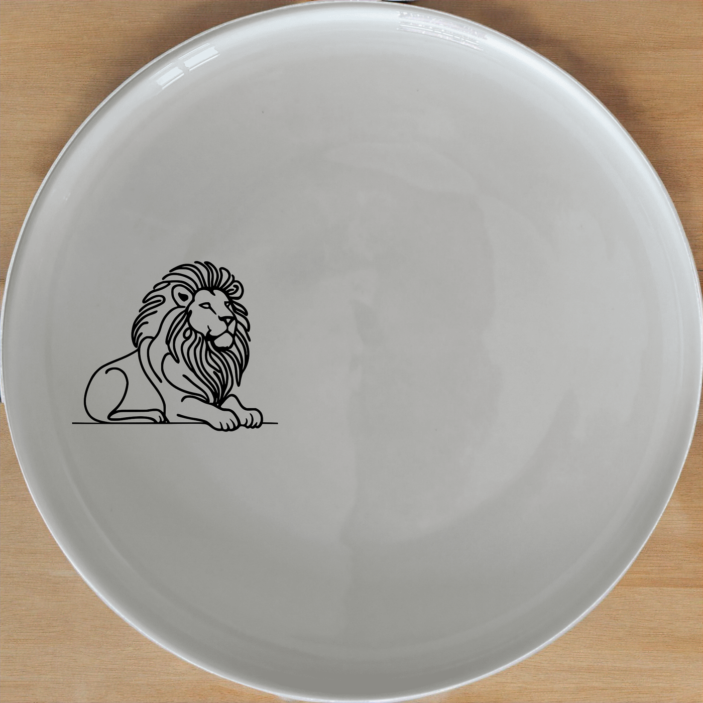 Crouching Lion Dinner Plate Set of 4 - Range 3 is a stylish and elegant set of four dinner plates featuring a crouching lion design. Perfect for adding a touch of sophistication to any dining table.