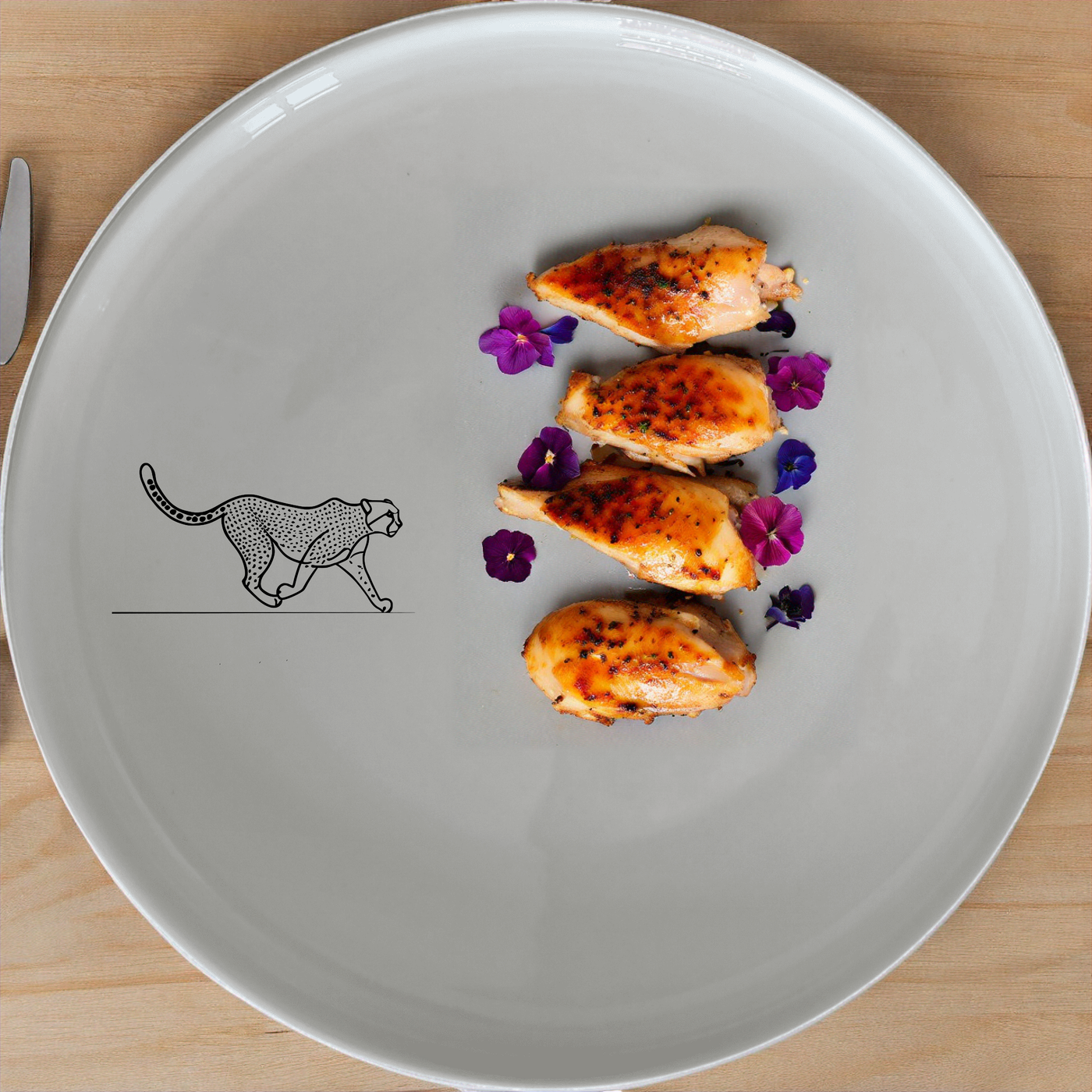 The Graceful Cheetah Side Plate Set of 4 - Range 1 features sleek cheetah designs on elegant white ceramic plates, perfect for modern dining.