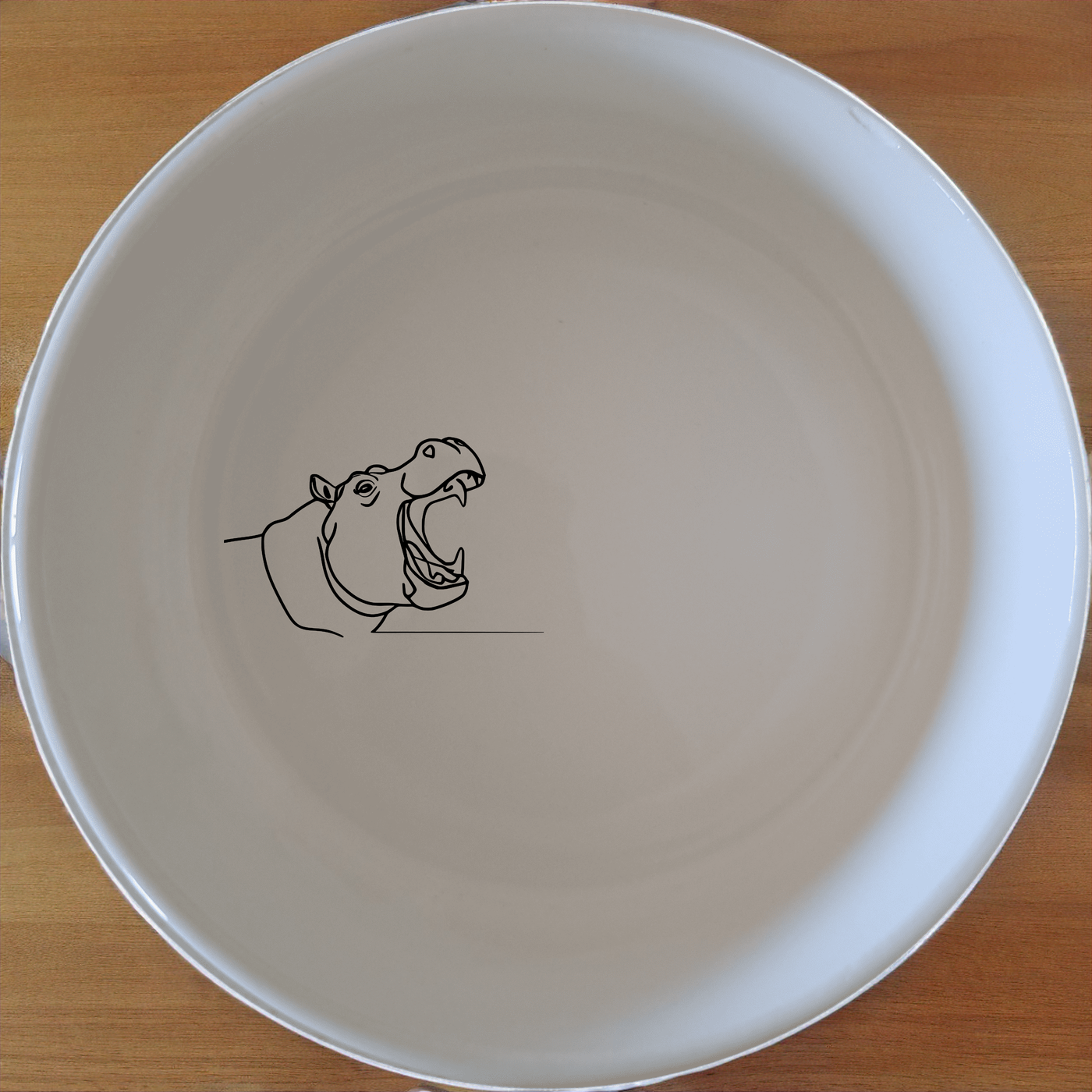The Hippo Yawning Bowl Set of 4 brings a playful touch to your dining table with its bold, open-mouthed hippo design.