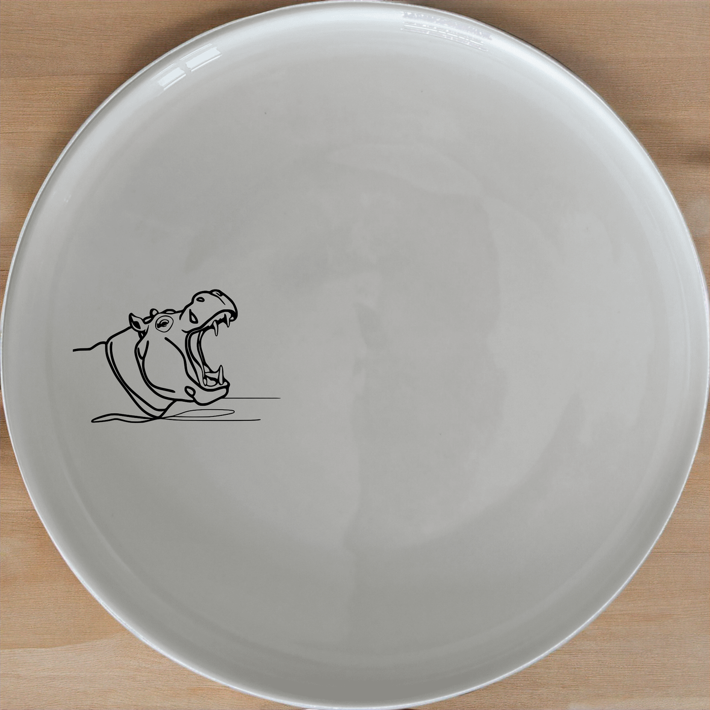 The Hippo Yawning Massive Jaw Open Dinner Plate Set of 4 adds a bold, playful touch to your dining table with its striking design.