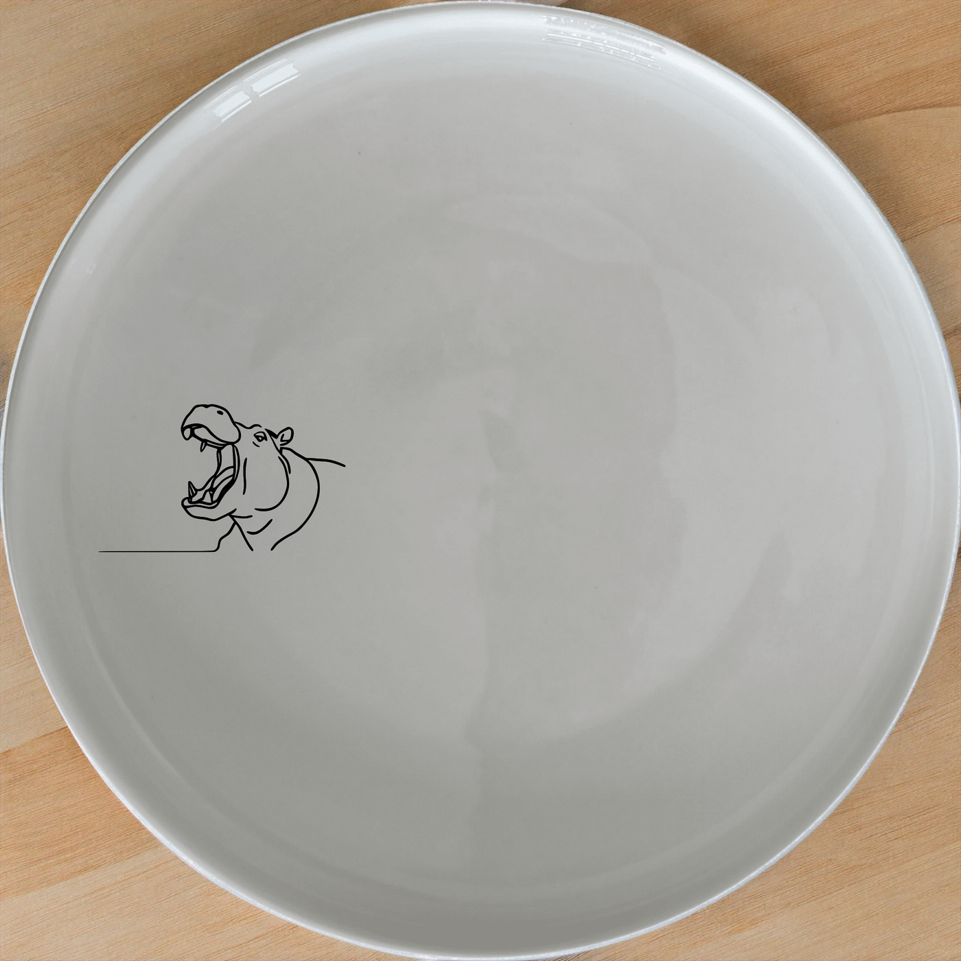 The Hippo Yawning Massive Jaw Side Plate Set of 4 - Range 1 offers a unique and playful design perfect for any dining table.