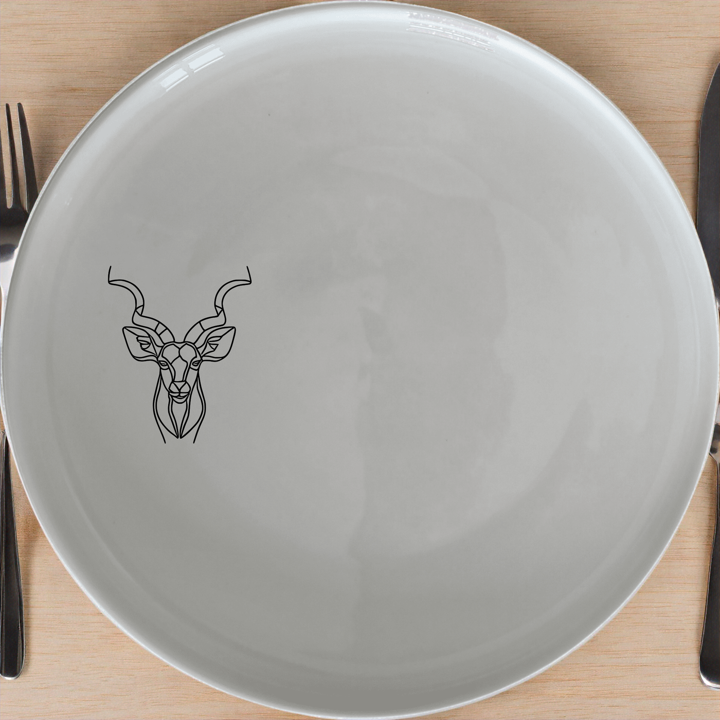 Kudu Antelope Dinner Plate Set of 4 - Range 2 adds a touch of nature to your dining table with elegant antelope designs.