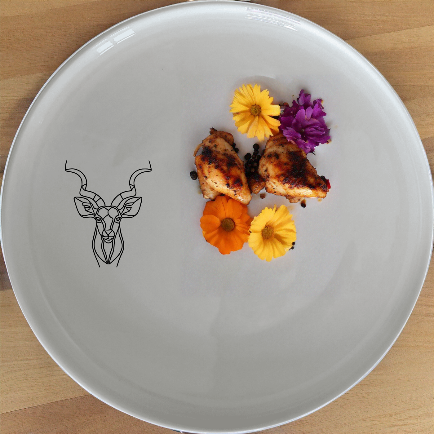 Kudu Antelope Side Plate Set of 4 - Range 2 adds a touch of elegance to your dining table with its unique design and high-quality ceramic construction.