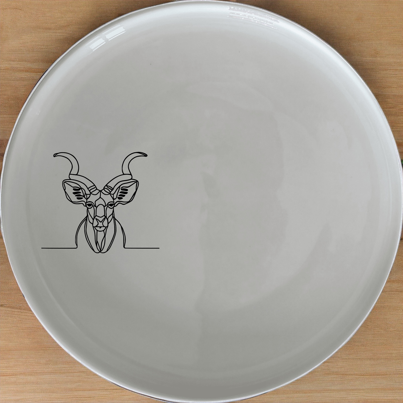 Kudu Antelope Side Plate Set of 4 - Range 4 offers a unique and stylish addition to your dining collection.