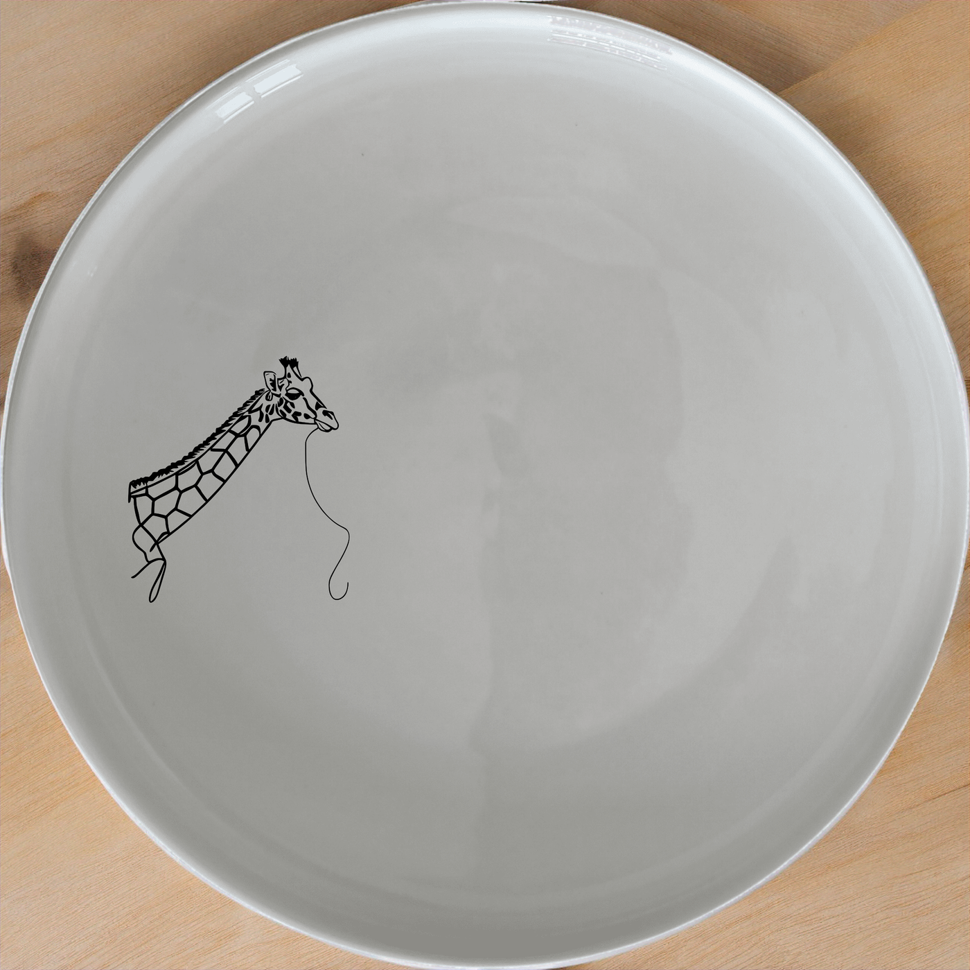 Majestic Giraffe Side Plate Set of 4 - Range 2 adds a touch of wildlife charm to your dining table, perfect for everyday use or special occasions.