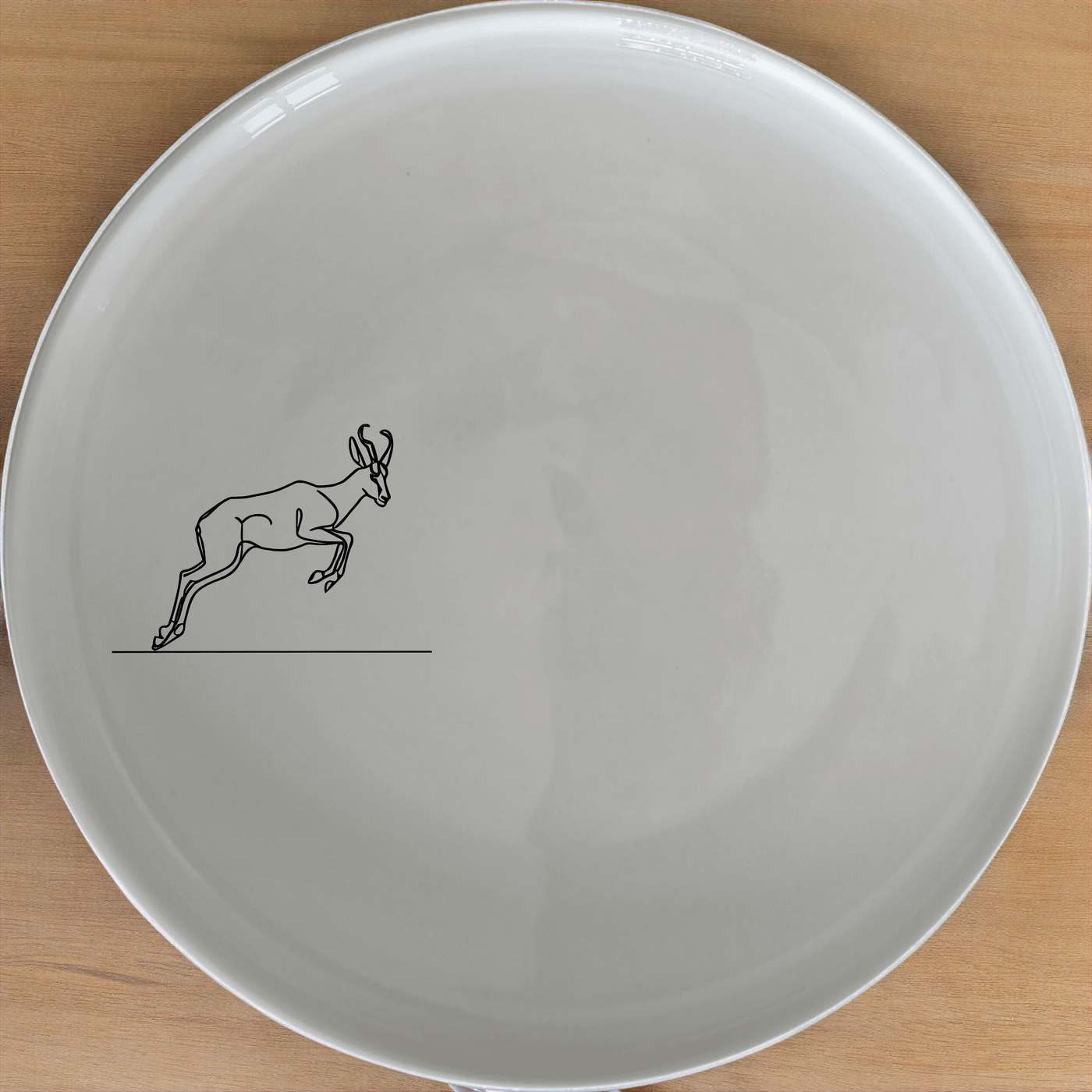 Springbok Leaping Antelope Side Plate Set of 4 - Range 1 adds a touch of wildlife elegance to your dining table. Perfect for nature lovers and art enthusiasts.