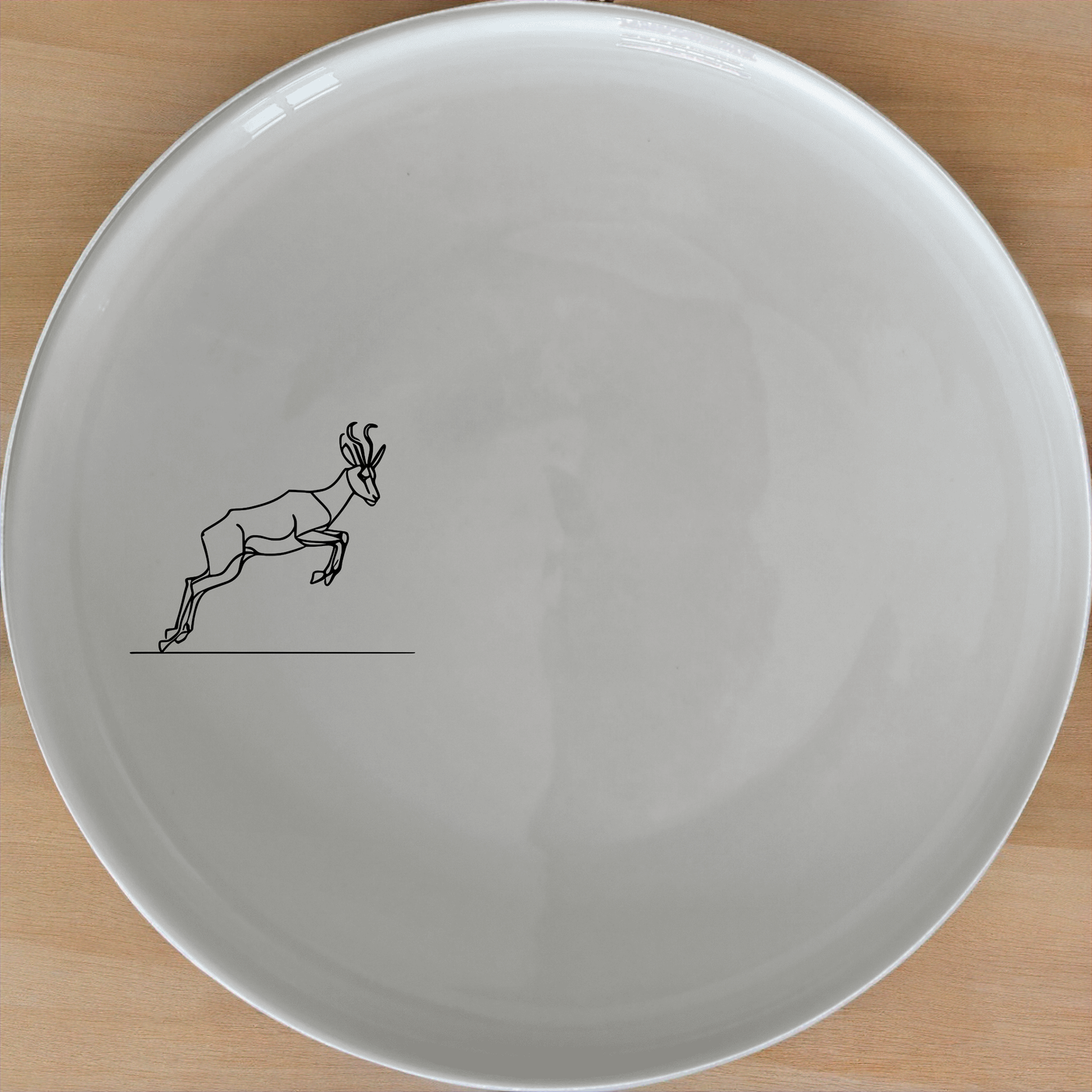 Springbok Leaping Side Plate Set of 4 - Range 2 is a stylish and modern dinnerware set featuring a leaping springbok antelope design.