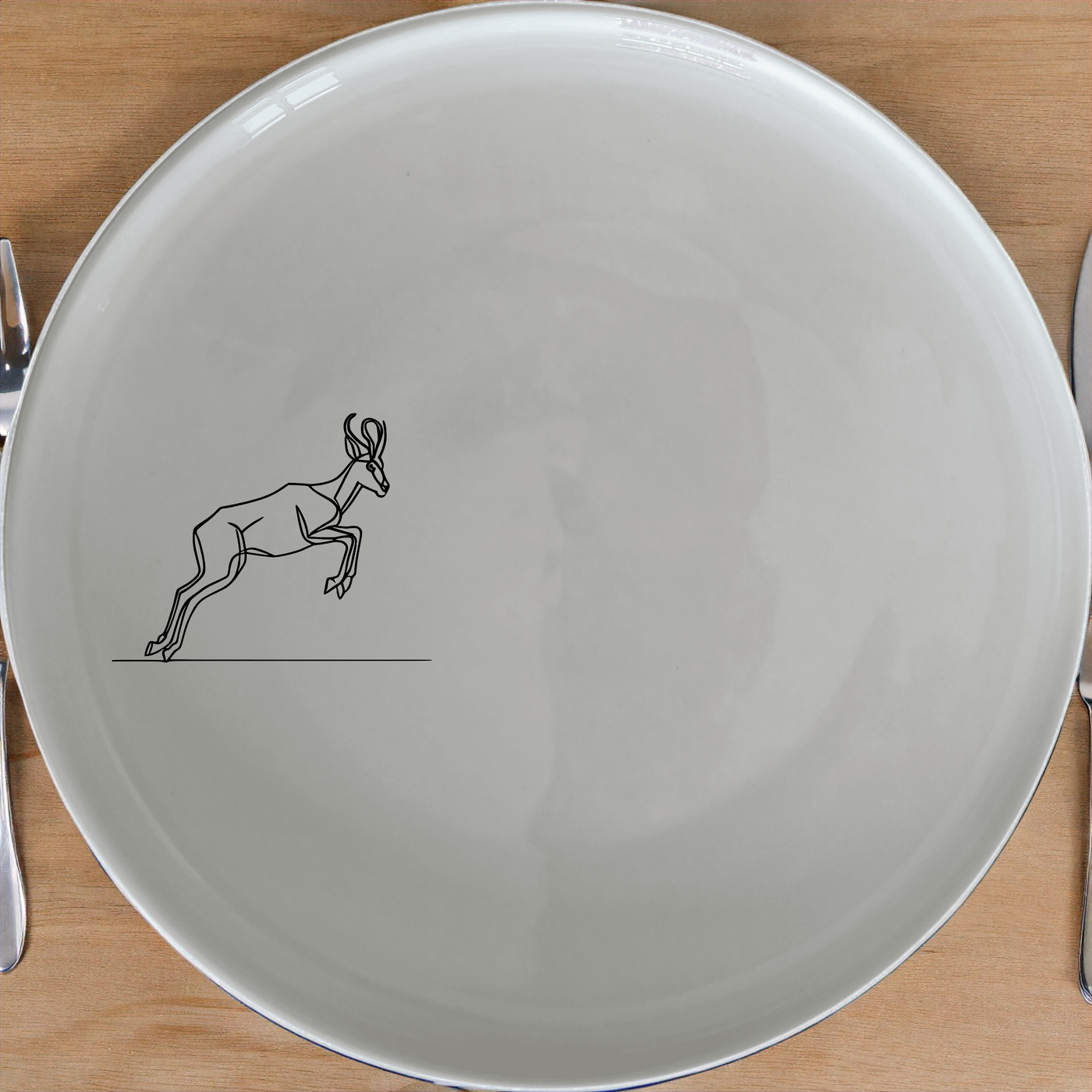 Springbok Leaping Antelope Side Plate Set of 4 - Range 1 is a stylish and elegant set of four side plates featuring a leaping springbok antelope design. Perfect for any dining occasion.