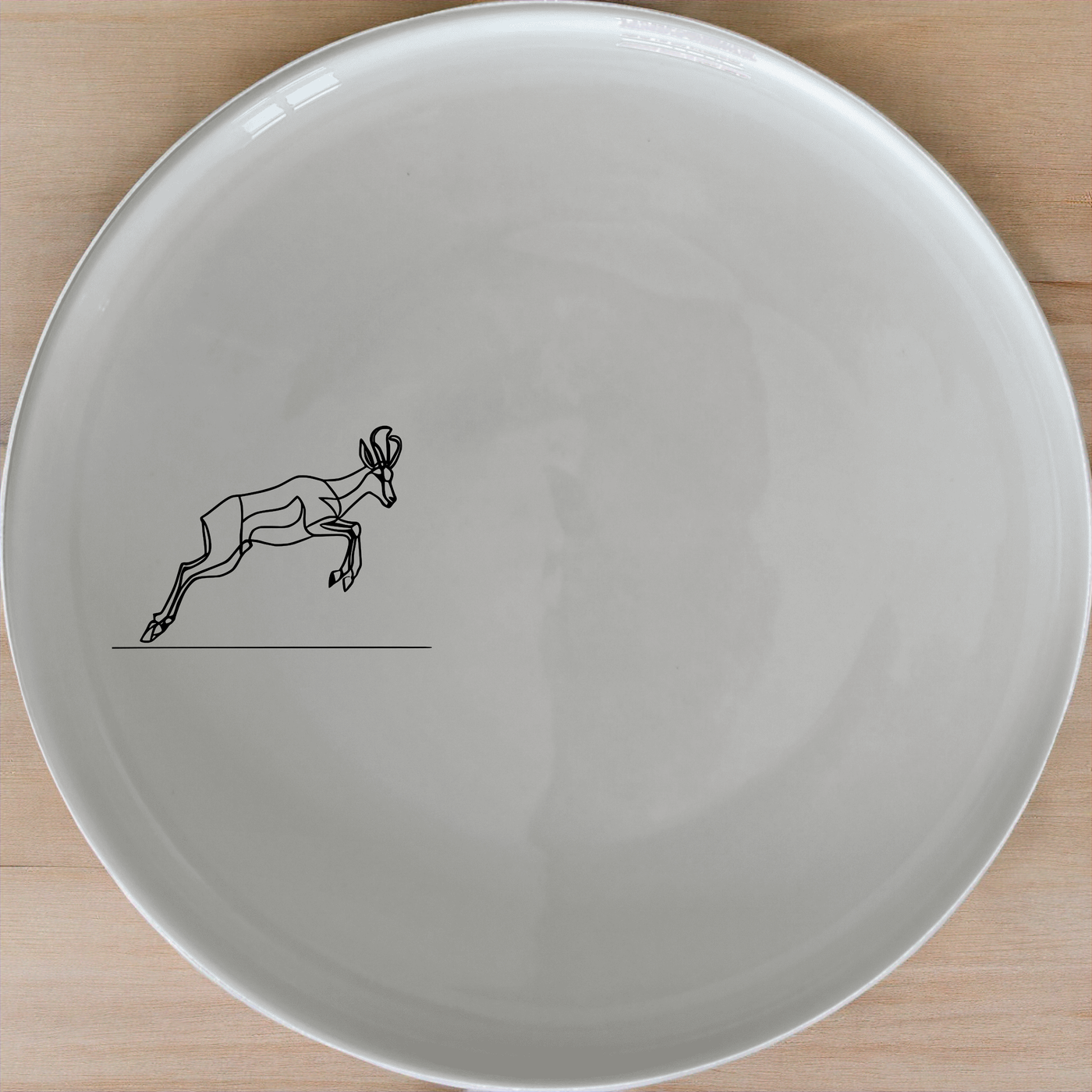 Springbok Leaping Antelope Side Plate Set of 4 - Range 4 offers a dynamic and artistic design perfect for modern dining.