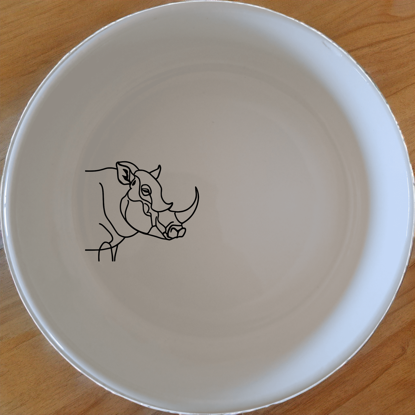 Warthog Tusk Bowl Set of 4 - Range 1 adds a unique touch to your dining experience with its artistic design and high-quality ceramic construction.