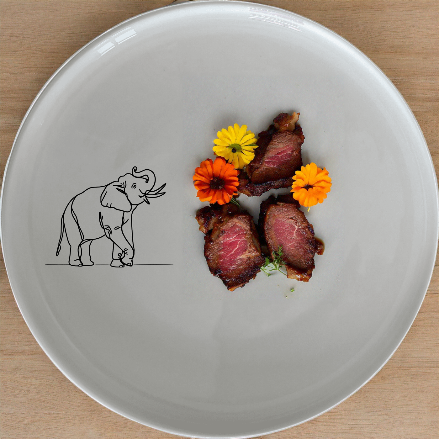 The Wise Elephant Matriarch Dinner Set of 12 brings a touch of nature to your dining table with its elegant elephant design.